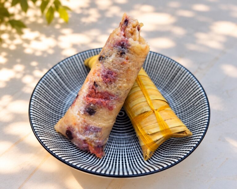Bánh lá dừa, a traditional Vietnamese coconut leaf cake, served in France